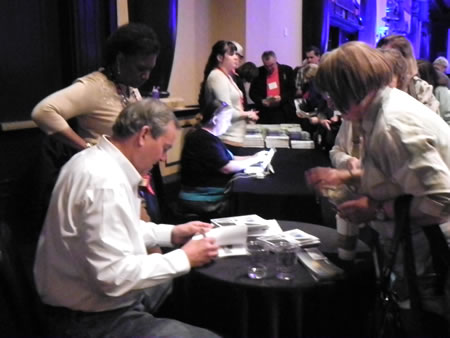 Speeker Signing Books at covention